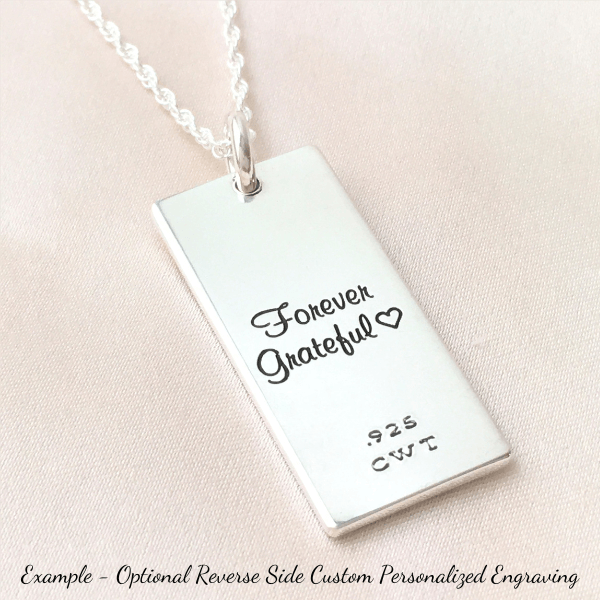 https://clothedwithtruth.com/cdn/shop/products/Optionalcustompersonalizedengravingexamplesterlingsilverrectanglependantnecklaces600t_798d9db8-35f8-477c-a490-e4c2bb820bbc_600x.png?v=1670625459